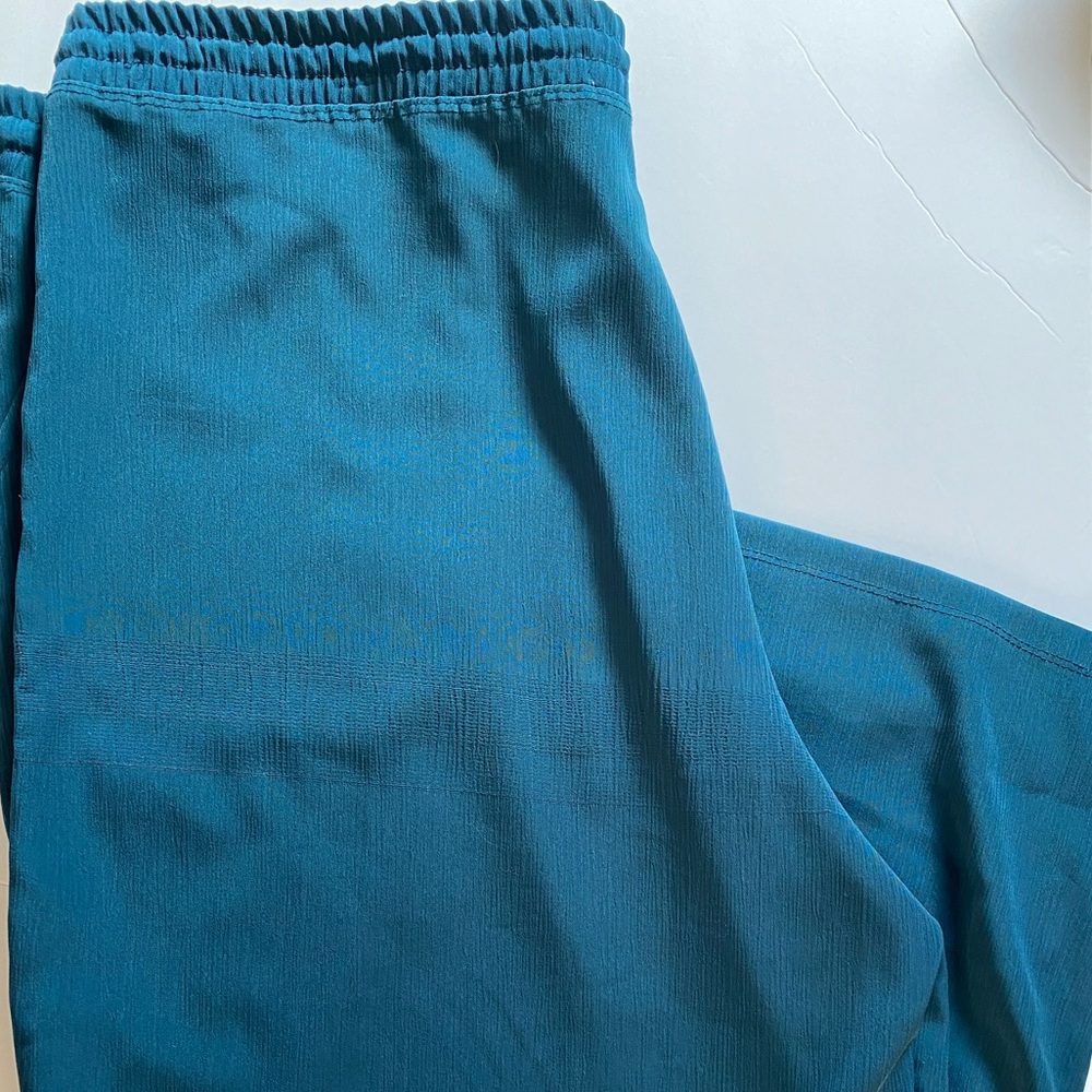 Turquoise blue satin pants